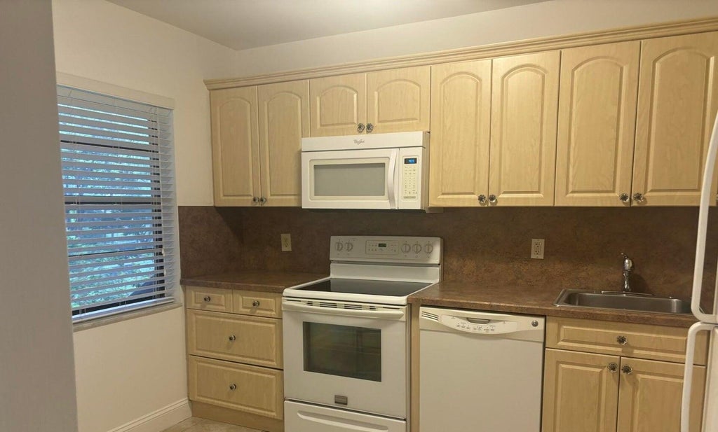 Photo of 9264 Vista Del Lago #H, Boca Raton, FL 33428 (MLS # B26069583)