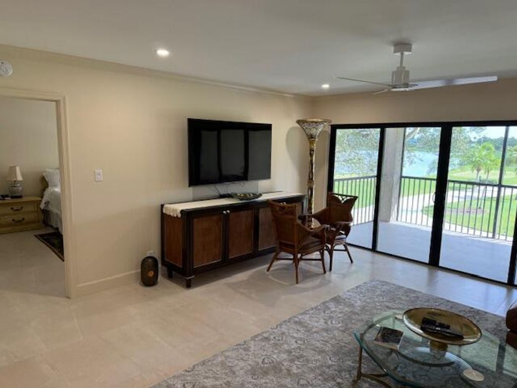 Photo of 13403 Touchstone Place #203, Palm Beach Gardens, FL 33418 (MLS # B26019973)