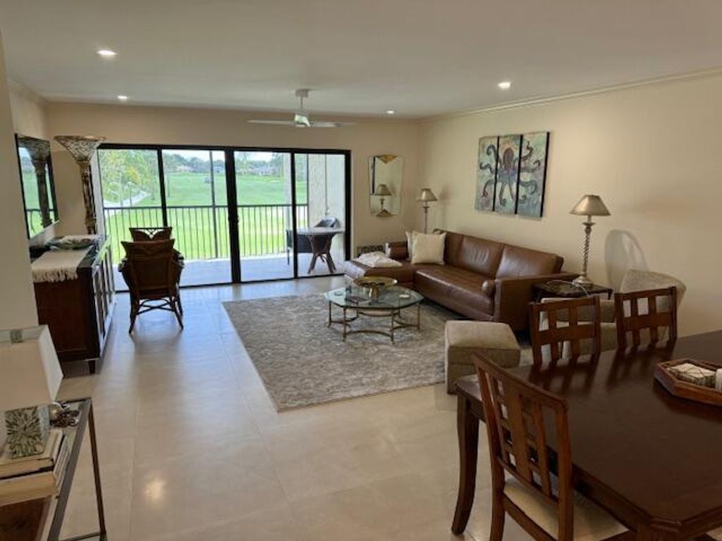 Photo of 13403 Touchstone Place #203, Palm Beach Gardens, FL 33418 (MLS # B26019973)