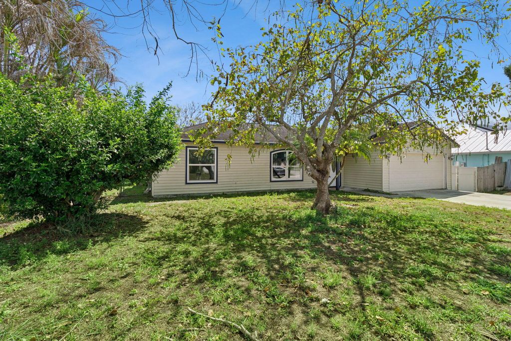 Photo of 3349 SW Frankford Street, Port Saint Lucie, FL 34953 (MLS # B26010631)