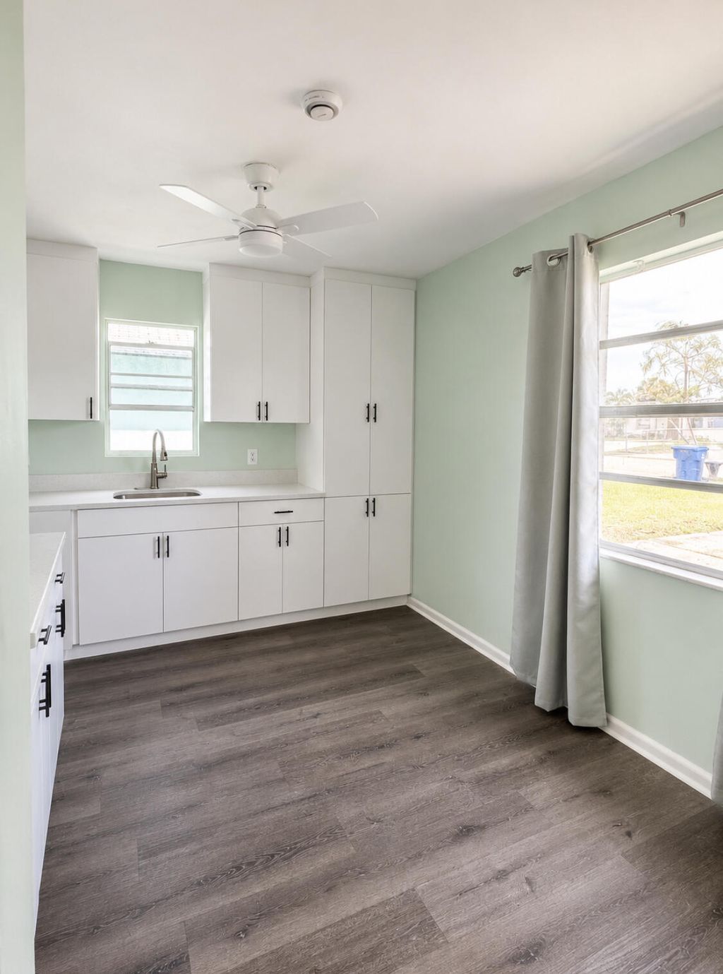 Photo of 1328 W 6th Street, Riviera Beach, FL 33404 (MLS # B26038303)