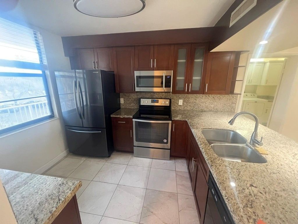 Photo of 1522 Whitehall Drive #304, Davie, FL 33324 (MLS # F10543335)