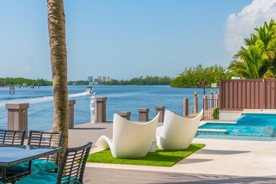 Spectacular new direct Intracoastal estate in exclusive Harbour East enclave.
Located on the widest part of the Intracoastal in Boca Raton with breathtaking water views of lake Wayman from all major living areas. 
This perfect floor plan features 6 bedroom & 6.5 bath, all en-suites, grand entry 26ft ceiling great room with a custom 11ft wine display & a quartz fireplace, European chef kitchen with state of art Italian countertops & waterfall island, Sub Zero & Wolf appliances,custom curbed glass railings & dazzling light fixtures. 11FT sliding impact glass doors open to a extensive 2,250 SqFt outdoor living area with wide open views overlooking the water, including a infinity edge pool, heated spa, summer kitchen & a oversized dock,creating the ultimate outdoor entertainment environment. Grand master suite with his and hers walk-in closets, lounge area with a wet-bar, wine cooler and incredible Intracoastal waterway views, connects to a large private 2nd floor balcony with stunning panoramic water views.
Security cameras, elevator, home automation system with built in speakers throughout.
Prime East Boca location, minutes to finest dining, shopping and resorts.
Yacht dockage along 87+/- ft of deep water, minutes to the Boca Inlet.
a resort-like paradise, a true must see.