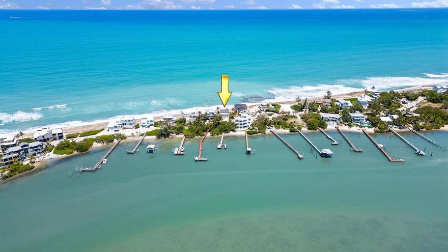 Incredibly rare double-waterfront opportunity. One of fewer than 60 properties in the USA that borders on both the Atlantic Ocean and the Intracoastal Waterway.  Enjoy a sunrise over the ocean, and sunsets over the intracoastal.This beautiful coastal home offers a large kitchen with Wolf gas range, Sub-Zero refrigerator and butler's pantry; two living spaces; beautifully updated interiors; and stunning views from every window.Be in the ocean by boat in less than 10 minutes--the 10,000 lb boat lift is ready for your vessel.Walk out your back door and down to peaceful Bathtub Beach or dine at popular Sewall's Point restaurants. Impact windows include transferable lifetime warranty. Come see this idyllic waterfront home today.