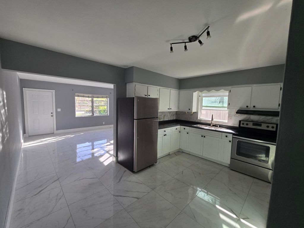 Photo of 1021 SW 32nd Court #1-2, Fort Lauderdale, FL 33315 (MLS # B26002262)