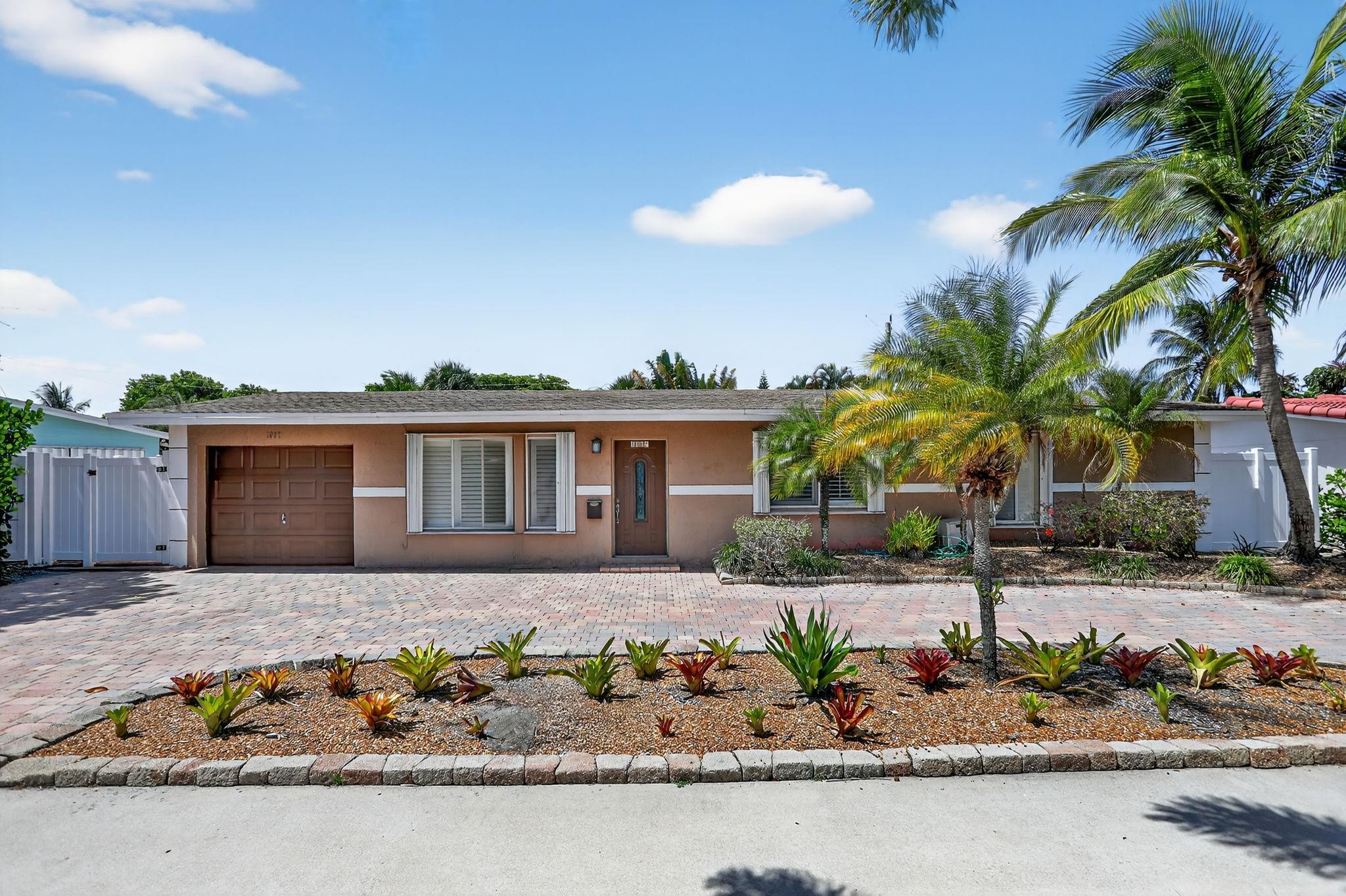 Experience Coastal Living in The Cove! This well-maintained pool home located in the heart of The Cove, one of Deerfield Beach’s most sought-after neighborhoods. Just minutes from the beach, premier shopping and dining, this spacious residence offers both convenience and charm. Featuring one of the few 4-bedroom layouts in the area, this home provides ample space for family, guests, or a home office. Step outside to your spacious private outdoor oasis—a fully fenced yard with PVC fencing, a sparkling pool, including 500 sqft of covered outdoor living space, perfect for entertaining or relaxing. Bring your personal touches and make this home your own. Don’t miss this rare opportunity to live in one of South Florida’s most desirable coastal communities!