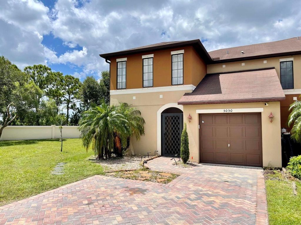 Photo of 5050 NW Coventry Circle, Port Saint Lucie, FL 34986 (MLS # R10946318)