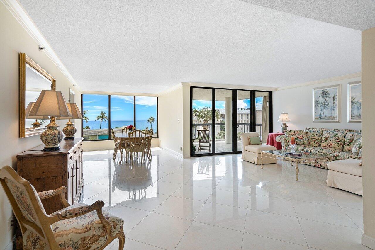 Experience the epitome of coastal living at Gulf Stream's prime location, where the Gulf Stream beach is just steps away. Prepare to be captivated by the allure of this rare gem--an exquisite fourth-floor unit offering breathtaking ocean views within the prestigious and exclusive community of L'Hermitage. This boutique building grants you the luxury of a single-family home combined with the convenience of a condominium lifestyle and allows your 4-legged companions. With ocean views from all main living areas you will elevate your senses with 2,682 square feet of elegant living space, conveniently accessed via a private elevator that opens directly into your own sanctuary.