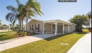 Enjoy every day in desirable adult community.Savanna Club features resort amenities. Savanna Club offers 3 pools, Theater, Tennise,Golf Course, Gyms, this home is closed to shopping & hospital. 2-bedroom 2 bath, spit plan., roof is 2 years old, air conditioning and water heater are new two. Laminated flooring,updated hurricane carport. Wash & Dryer are inside. Motivated Seller