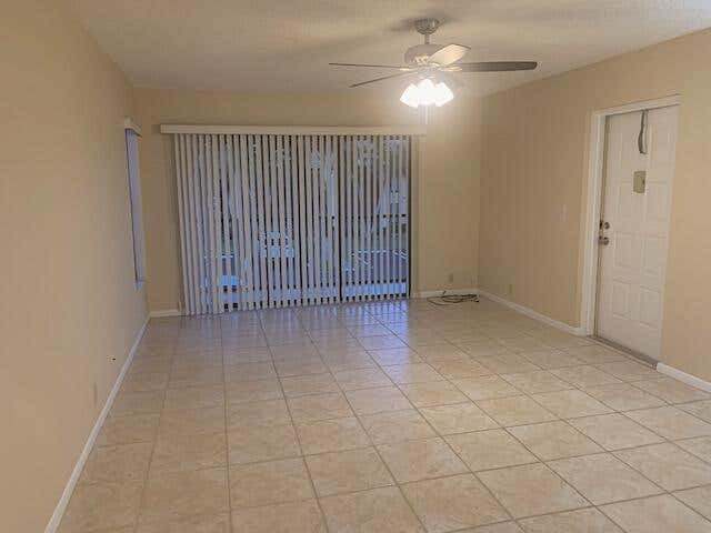 Photo of 801 SKY PINE Way #D2, Greenacres, FL 33415 (MLS # B26067866)