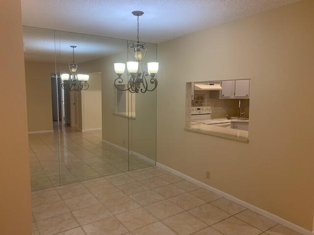 Photo of 801 SKY PINE Way #D2, Greenacres, FL 33415 (MLS # B26067866)