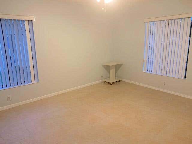 Photo of 801 SKY PINE Way #D2, Greenacres, FL 33415 (MLS # B26067866)