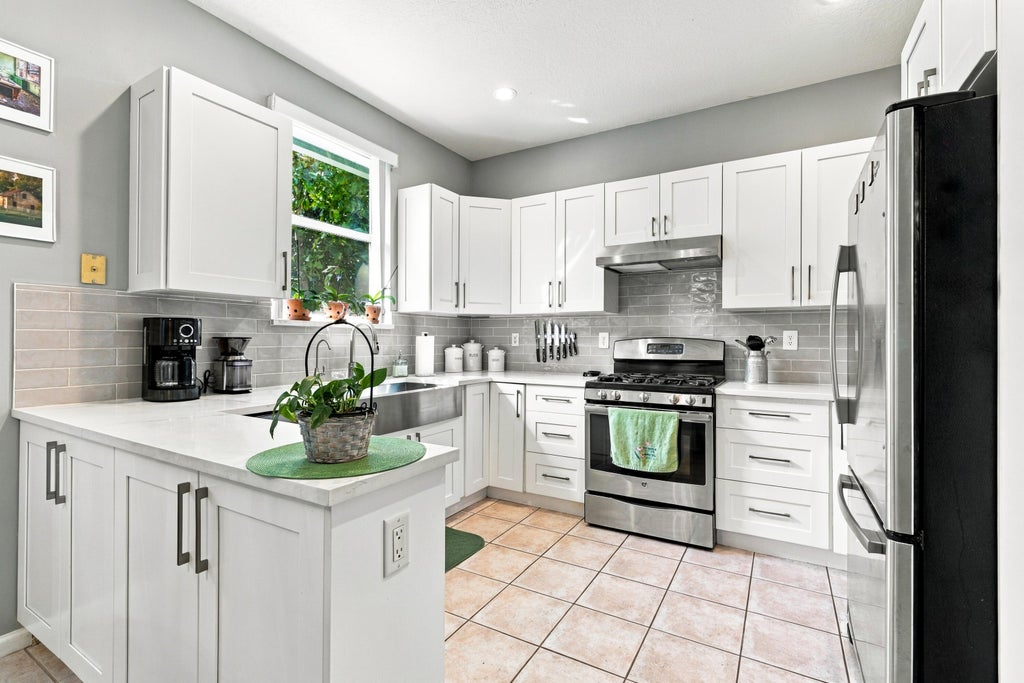 Photo of 1034 Cape Cod Terrace, Greenacres, FL 33413 (MLS # B26090310)