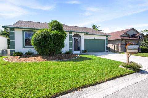 Photo of 1034 Cape Cod Terrace, Greenacres, FL 33413 (MLS # B26090310)