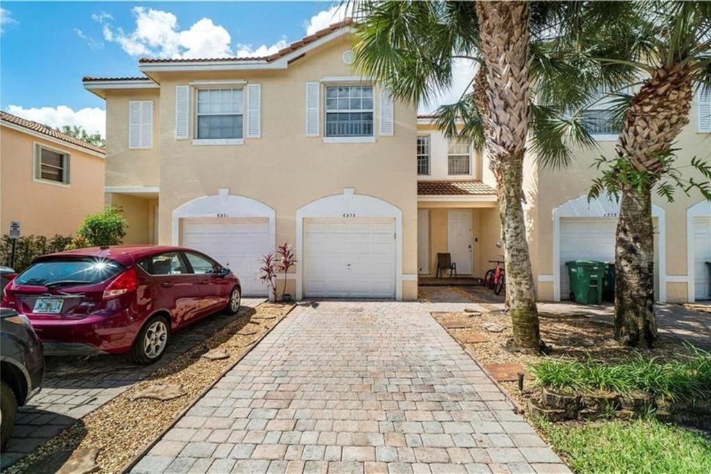 Photo of 6373 Landings Way, Tamarac, FL 33321 (MLS # F10535160)