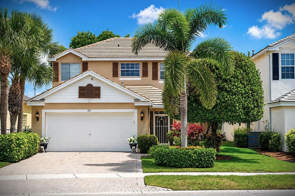 Photo of 217 Berenger Walk, Royal Palm Beach, FL 33414 (MLS # B26029001)