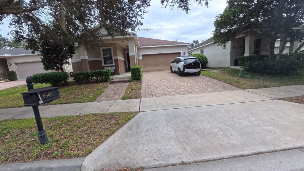 Photo of 8809 Arrabida Lane, Orlando, FL 32836 (MLS # B26000498)