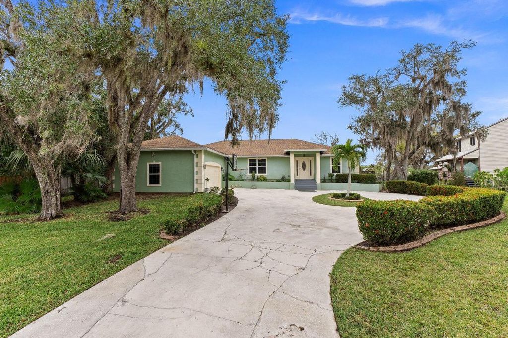 Photo of 2351 Sweetwater Drive, Fort Pierce, FL 34981 (MLS # R11156185)