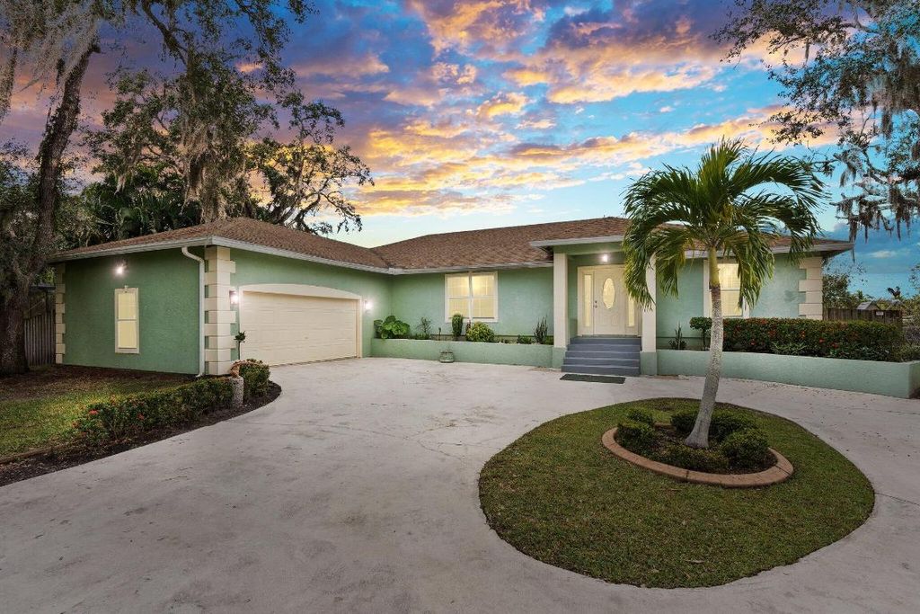 Photo of 2351 Sweetwater Drive, Fort Pierce, FL 34981 (MLS # R11156185)