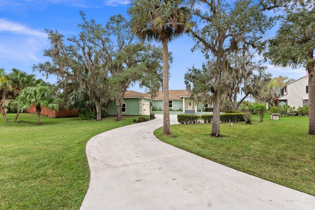 Photo of 2351 Sweetwater Drive, Fort Pierce, FL 34981 (MLS # R11156185)