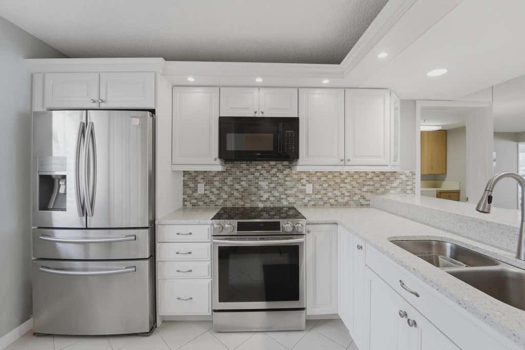 Photo of 2601 MARINA ISLE Way #204, Jupiter, FL 33477 (MLS # B26059880)