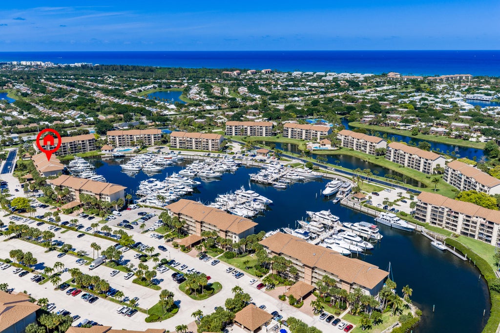 Photo of 2601 MARINA ISLE Way #204, Jupiter, FL 33477 (MLS # B26059880)