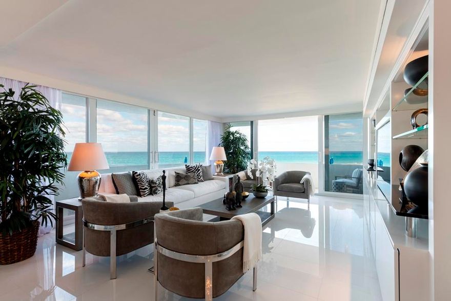 Completely renovated with amazing views with a wrap around balcony. Top of the line finishes include Glassos floors, white Caesarstone open kitchen with Bosch appliances, and marble bathrooms with inlays and hurricane impact doors. Full service ''in-town'' building.