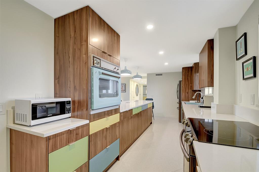 Exceptional Opportunity to LEASE (seasonal-3 months) in a full amenity premier Intracoastal building on Palm Beach. Just steps from your own private beach, nestled between the Ocean & the Intracoastal Waterway, this rarely offered retro-themed 2-Bedroom, 3-Bath condo with adjoining Studio apartment w/Queen Size pull-out bed has been completely renovated featuring an open-concept designed Kitchen with high-end finishes. The resort-style amenities include a new, state-of-the-art President's Club w/Media Room, Kitchen, Bar & Fitness Center, 24hr door person, security cameras, pool, boat dock & private deeded Beach access for Residents & Tenants Only. The large extended Balcony overlooks the Intracoastal and can be accessed from every room.