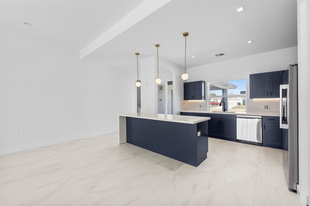 Photo of 4043 SW Port St Lucie Boulevard, Port Saint Lucie, FL 34953 (MLS # F10504226)