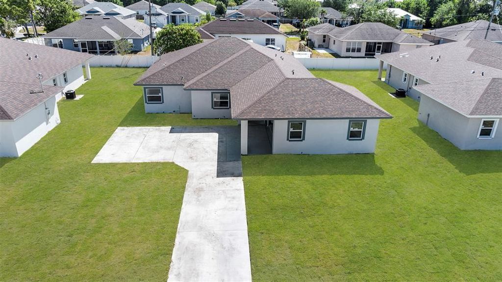 Photo of 4043 SW Port St Lucie Boulevard, Port Saint Lucie, FL 34953 (MLS # F10504226)