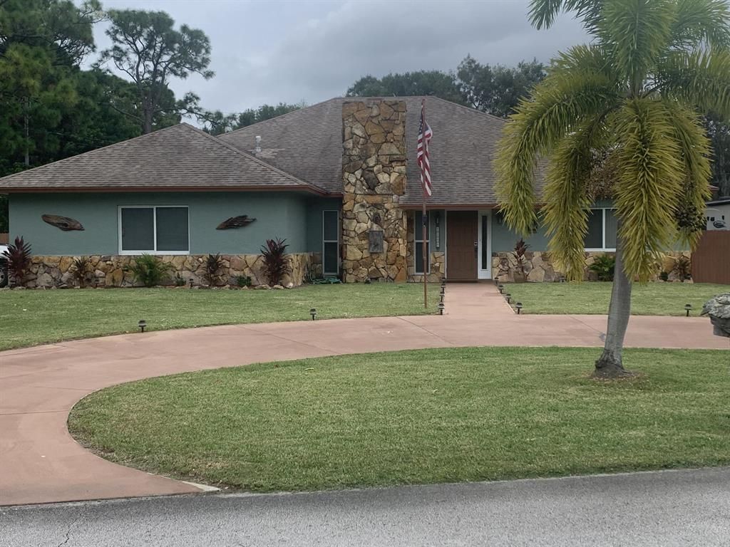 Photo of 7206 Coquina Avenue, Fort Pierce, FL 34951 (MLS # R10758965)