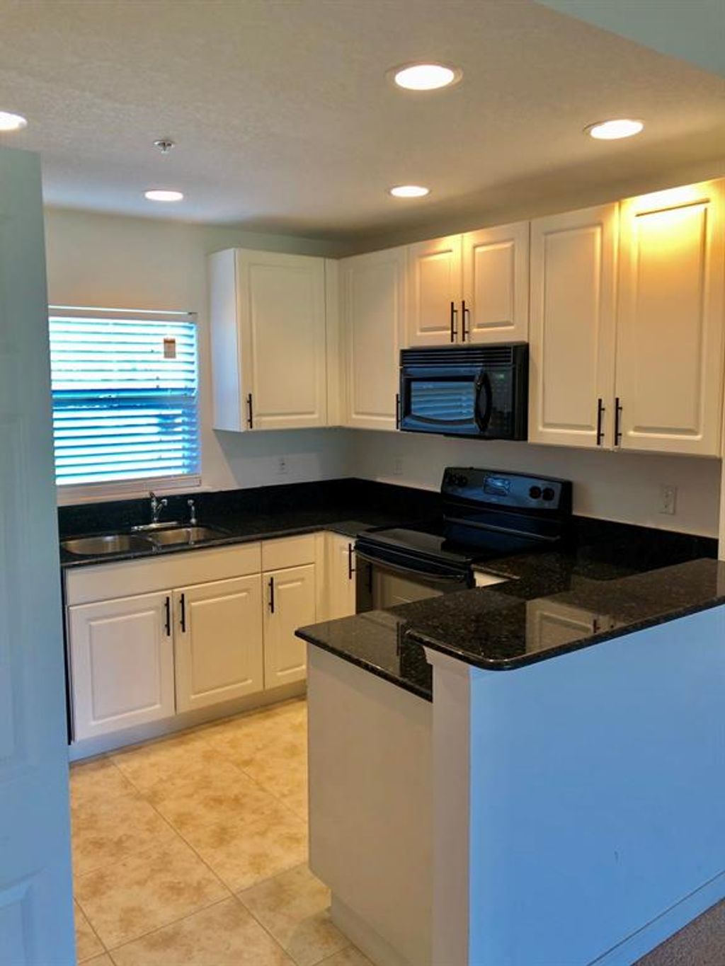 Photo of 1800 Nebraska Avenue #101, Fort Pierce, FL 34950 (MLS # R10720122)