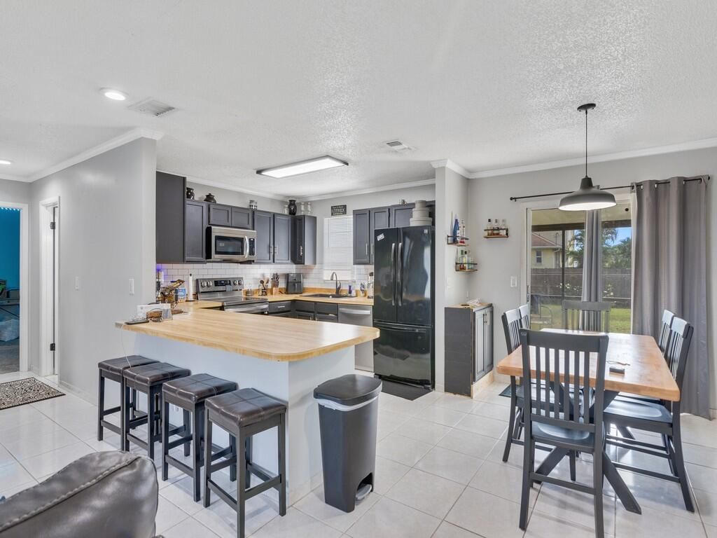 Photo of 542 SE Faith Terrace, Port Saint Lucie, FL 34983 (MLS # R11160224)