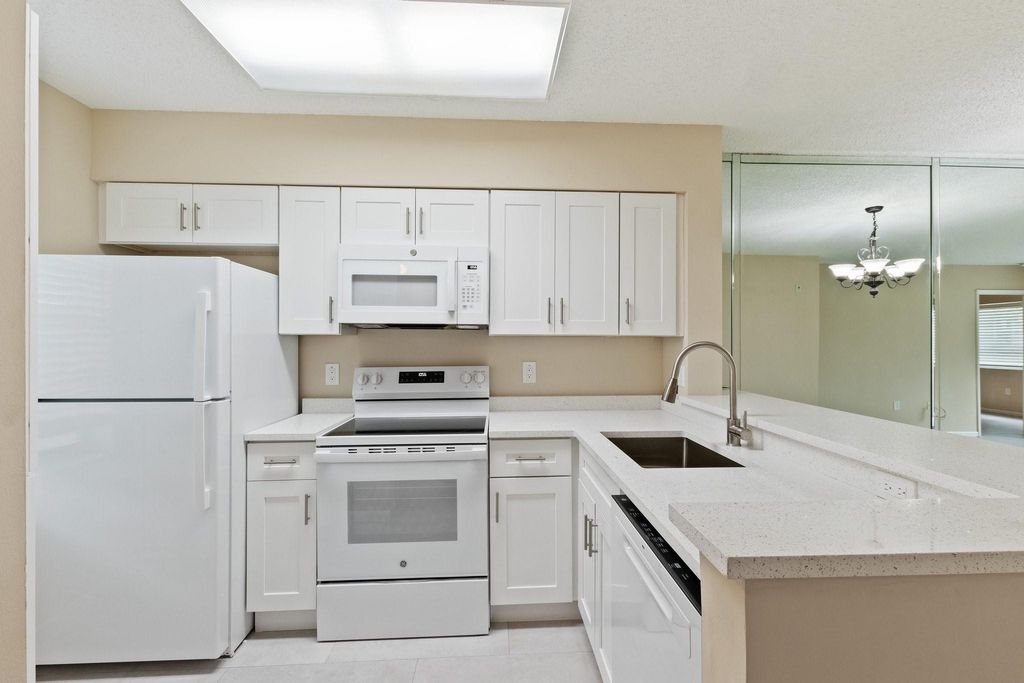 Photo of 2236 N Cypress Bend Drive #112, Pompano Beach, FL 33069 (MLS # F10474290)