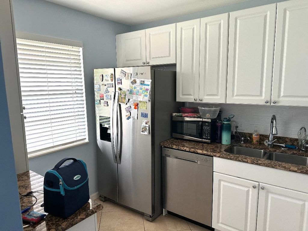 Photo of 234 Lake Meryl Drive, West Palm Beach, FL 33411 (MLS # R11154956)