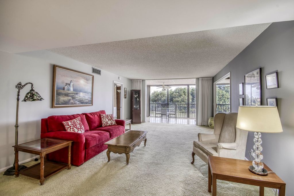 Photo of 5250 Woodland Lakes Drive #226, Palm Beach Gardens, FL 33418 (MLS # R11154616)