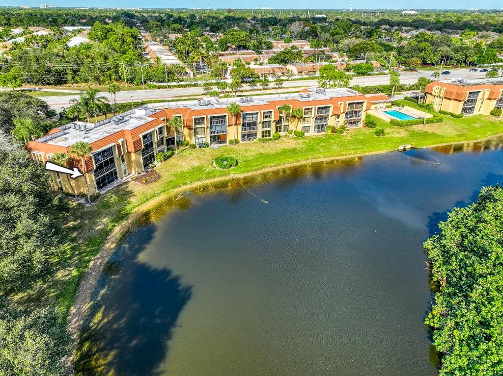 Photo of 5250 Woodland Lakes Drive #226, Palm Beach Gardens, FL 33418 (MLS # R11154616)