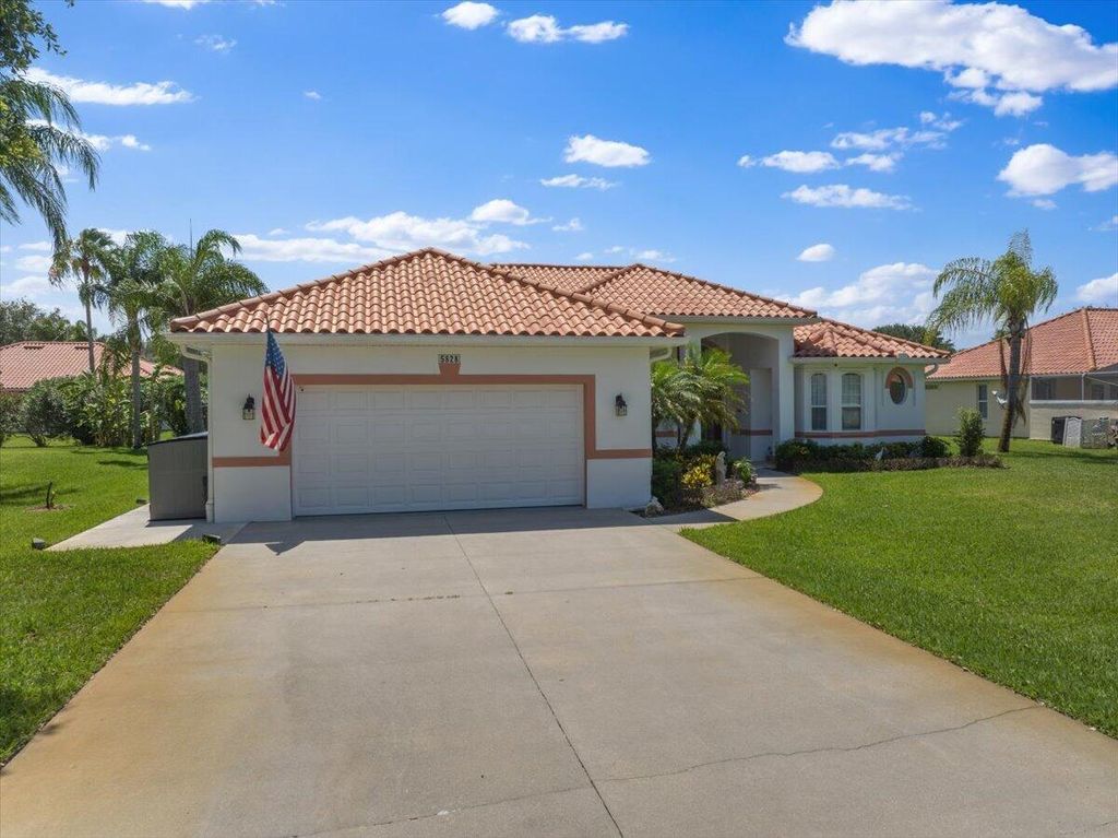 Photo of 5828 Pine Ridge Circle, Vero Beach, FL 32967 (MLS # B26031978)