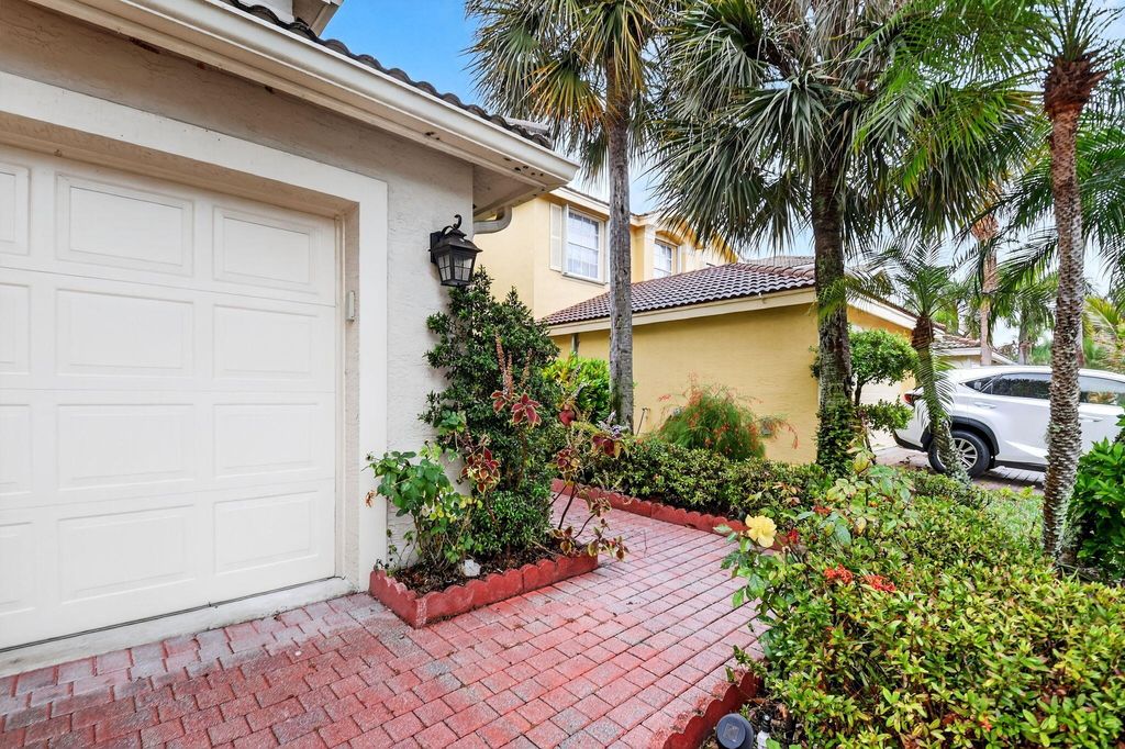 Photo of 5029 Starblaze Drive, Greenacres, FL 33463 (MLS # B26004983)