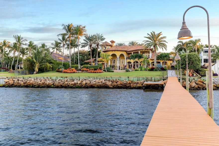 Motivated To Sell!... Experience unmatched luxury in this custom-built waterfront estate in Stuart, FL. Set on over an acre, this 13,000 sq. ft. masterpiece includes 5 bedrooms, 7 bathrooms, a 5-car garage, and exquisite custom woodworking. The main-floor primary suite features light onyx counters, dual closets, and spa-like en suite with pool and water views. Enjoy an oversized pool, grotto, waterfall, chef’s outdoor kitchen, and private dock with 40K, 20K, and 12K lb lifts. A circular drive, grand fountain, covered portico, private elevator, and third-floor tower with panoramic views complete this rare gem.  Floor Plan & Virtual 3D Tour Available upon request.  Easy to Show. Minimal Notice Required.