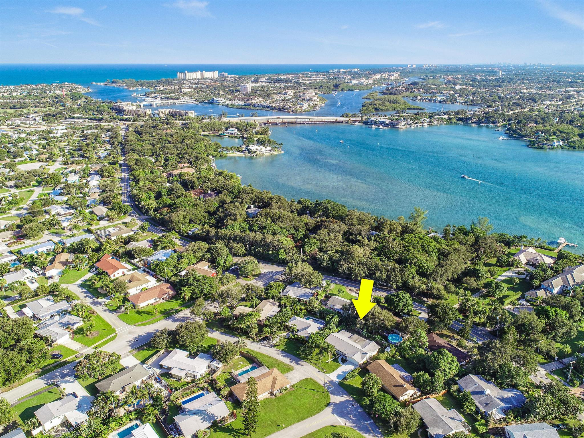 Charming Beachside Retreat Nestled just off Riverside Drive, just moments from the pristine sands of Jupiter Beach, this beautifully renovated single-family home offers the ultimate coastal lifestyle. With 3 bedrooms, 2 bathrooms, and a spacious open-concept living area, this home is perfect for those seeking the quintessential Jupiter lifestyle. The modern kitchen has tons of cabinet and counter space and with stainless steel appliances making it a chef's delight. Spacious living and dining room make it perfect for entertaining or a large family. Completely fenced & private backyard. Friendly community with close proximity to Jupiter Beach, Harborside, and all the new restaurants in town! Offering flexible lease terms & furnished/unfurnished to suit your needs.