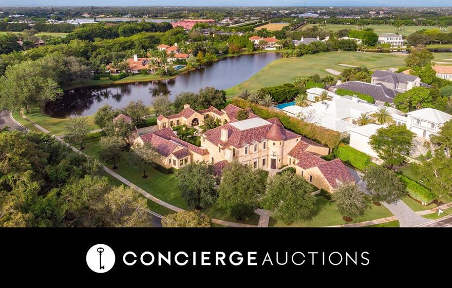 AUCTION: Bid Online October 20–22. Currently Listed for $11.99M. No Reserve. Open Daily 1-4PM & By Appointment.

The old world meets the new in La Charente, a French-inspired and thoughtfully designed estate by Laszlo Wagner of the Landfall Group. Located in the prestigious Bridle Path subdivision of Palm Beach Polo and Country Club, the property's classical garden courtyard welcomes you. This gorgeous home combines all the beauty of an historic French chateau with an open, modern floor plan and has the potential to become a treasured family compound. From the grand walkway outside, you enter into the spacious estate, which welcomes you in with warm wooden ceilings and a light, airy interior. The gourmet kitchen features two islands, a stunning vaulted wood ceiling, and chandeliers. In addition to the abundant spaces for eating and entertaining, this mansion has six sizable bedrooms. The massive master suite boasts beautiful French doors and a gorgeous en suite bath with two vanities and a freestanding tub. The charming turret is a perfect workout room or potential office space with abundant light right off of the master. Outside, escape to your classically landscaped courtyard and sculpture gardens, which feature a 14th century fountain and a covered loggia with 18th century French antique fireplace.