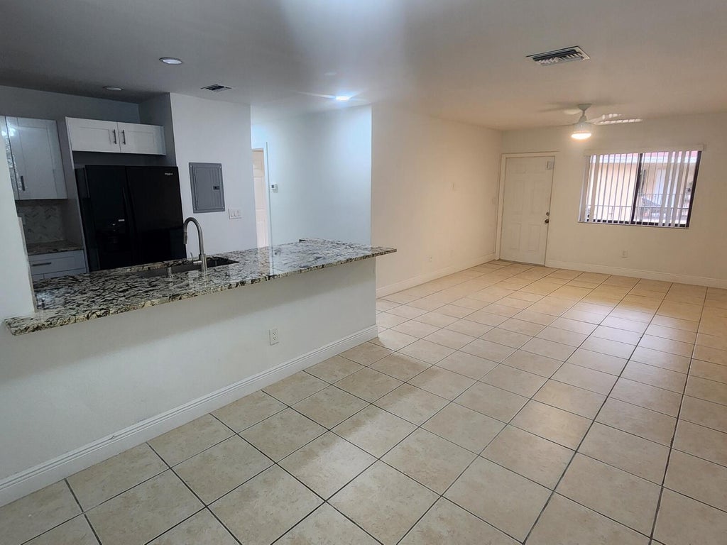 Photo of 6013 10TH Avenue N #208, Greenacres, FL 33463 (MLS # B26089283)