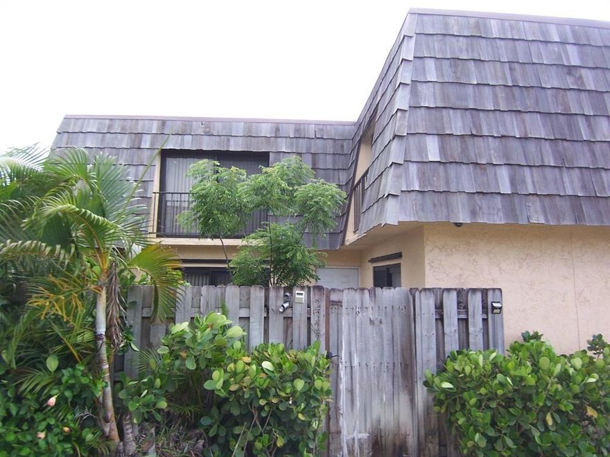 This beautiful, well maintained Town Home located in a gated  community  features an upgraded kitchen with Gas Range & Upgraded Backsplash,,Upgraded  bathrooms with Rain Shower,  and  Upgraded  appliances. Ceramic Tile Floors on the first level and Engineered Hardwood floors upstairs. Washer and Dryer in the unit.  Conveniently located to shopping and the Interstate.