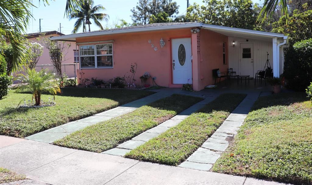 Photo of 626 Hunter Street, West Palm Beach, FL 33405 (MLS # R10679360)
