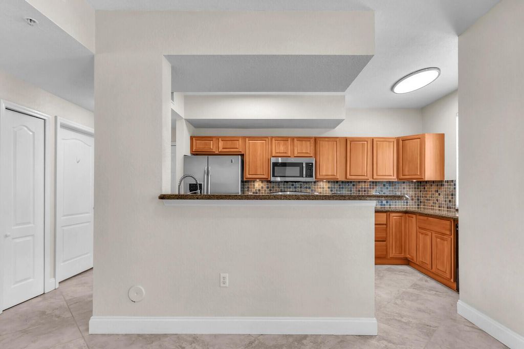 Photo of 11010 Legacy Drive #101, Palm Beach Gardens, FL 33410 (MLS # R11133311)