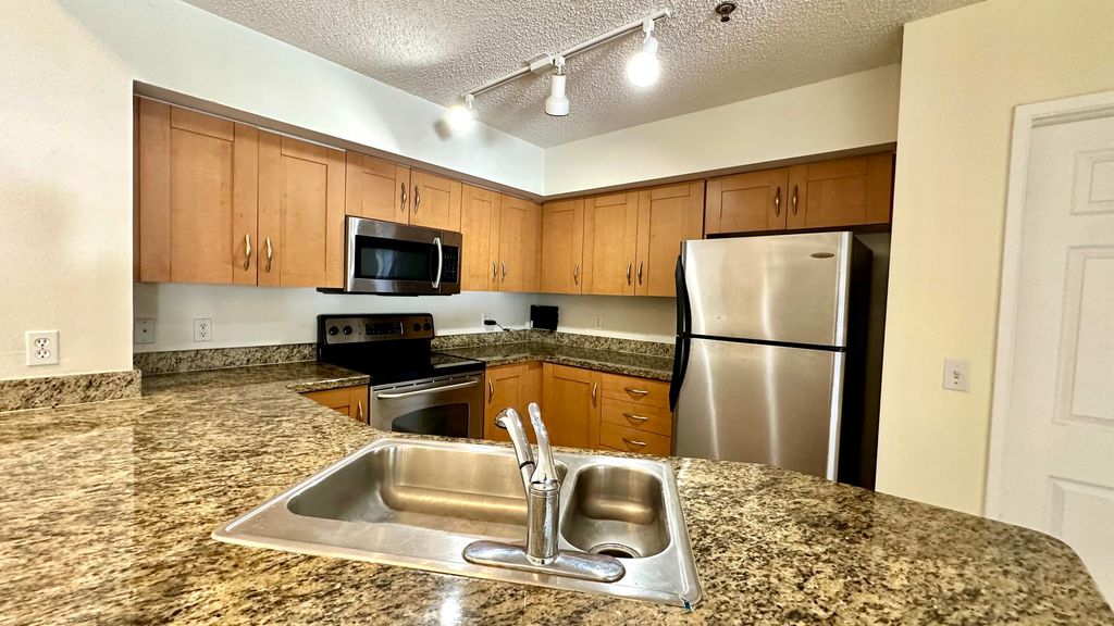 Photo of 3237 Clint Moore Road #205, Boca Raton, FL 33496 (MLS # R10937332)