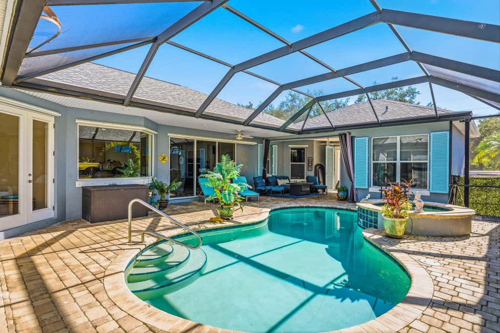 Photo of 228 Oak Hammock Circle SW, Vero Beach, FL 32962 (MLS # B26048889)