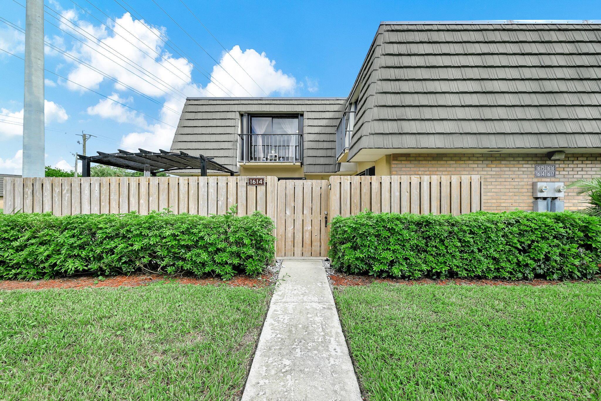Beautifully updated 2BR/2.5BA townhouse offering 1,236 sq. ft. with a new kitchen, remodeled bathrooms, and updated flooring throughout. Spacious primary suite features dual sinks, walk-in closet & separate shower, while the second bedroom has its own private bath. Enjoy a large fenced patio, accordion shutters, and newer roof (2018). HOA includes cable, water, exterior, roof & more. Community amenities: pools, tennis, playgrounds, dog park & fitness trails. Conveniently located near shopping, dining, I-95 & downtown West Palm Beach. Pet friendly!