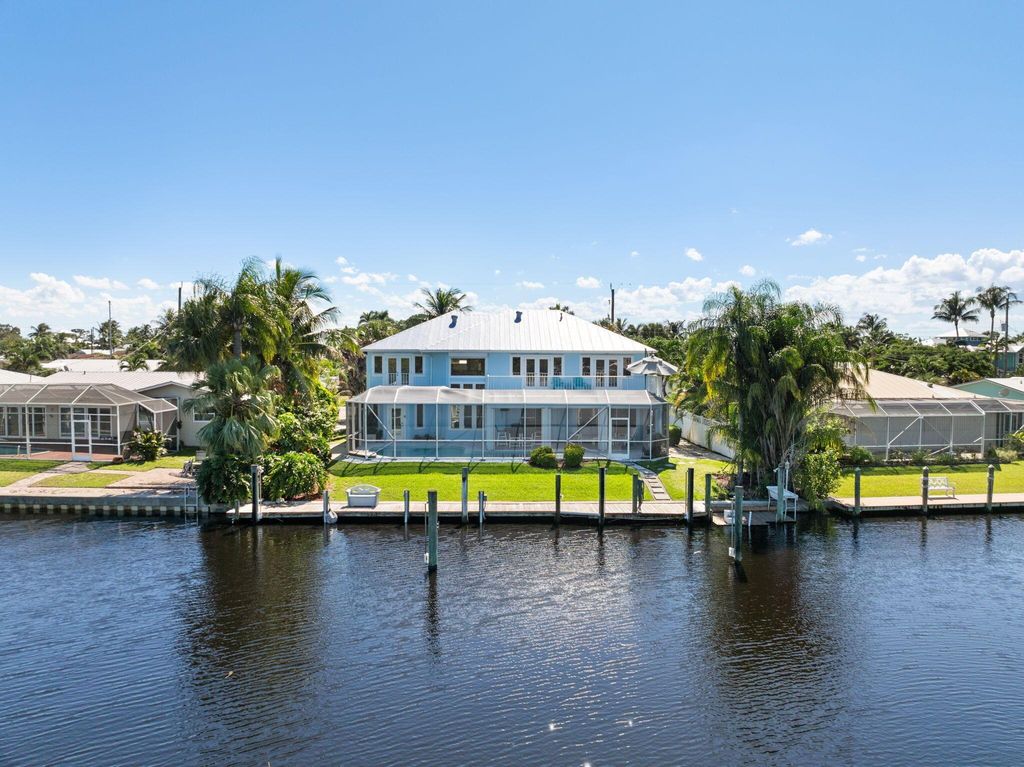 Photo of 1343 SW Seagull Way, Palm City, FL 34990 (MLS # R11132433)